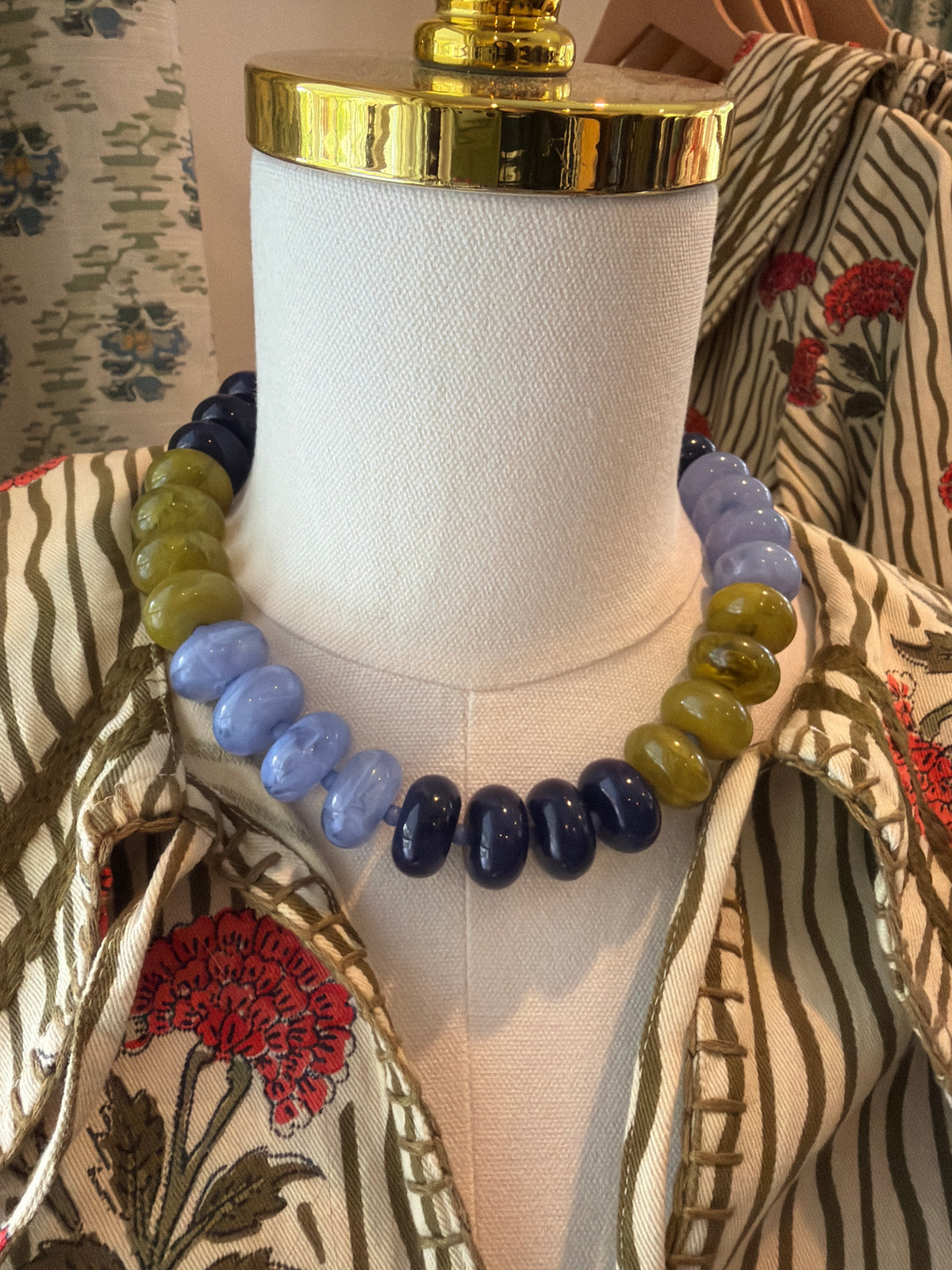 Fall Multicolor Bubble Necklace in olive, periwinkle and navy beads on a dress form
