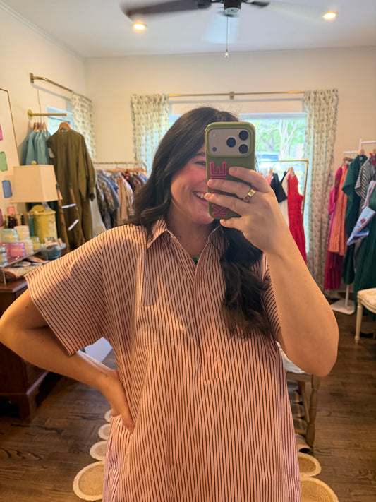 Model taking a close mirror photo in the Pink and Brown Stripe Midi, showing the stripes and split collar