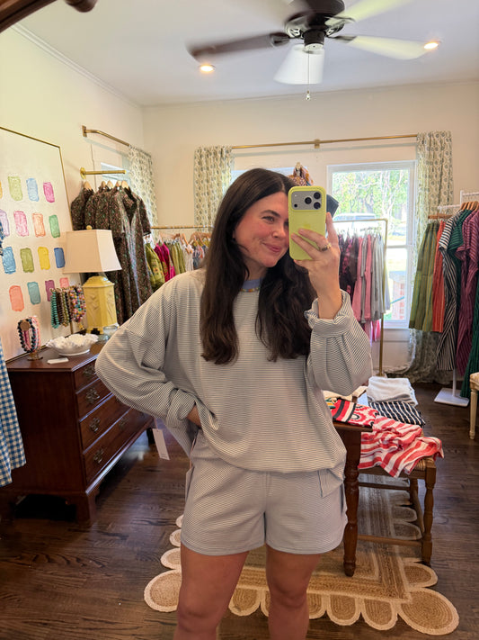 Model taking a mirror photo in the Periwinkle Ribbed Shorts with the matching top