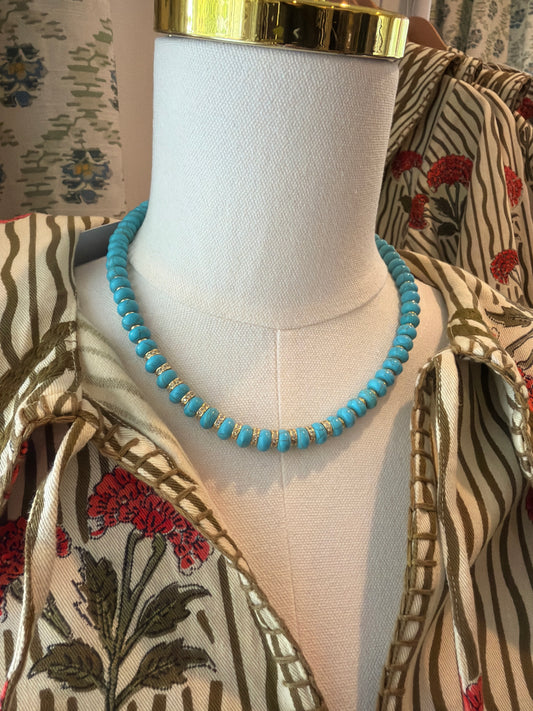 Turquoise Stone Mini Bead Necklace on a dress form over a print shirt