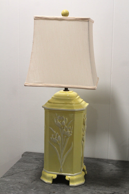 Vintage Yellow Tulip Lamp with a cream shade shown in full on a gray table