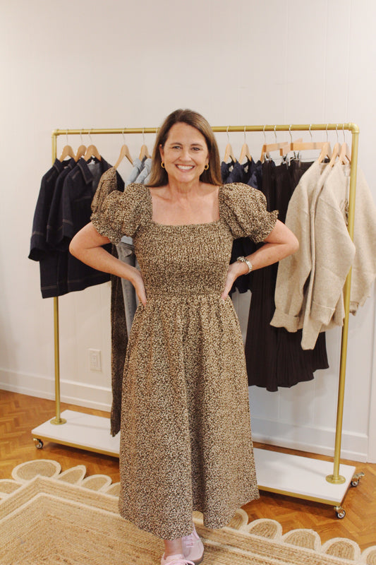 Model wearing the Diana Midi, a brown print smocked midi with puff sleeves, full length